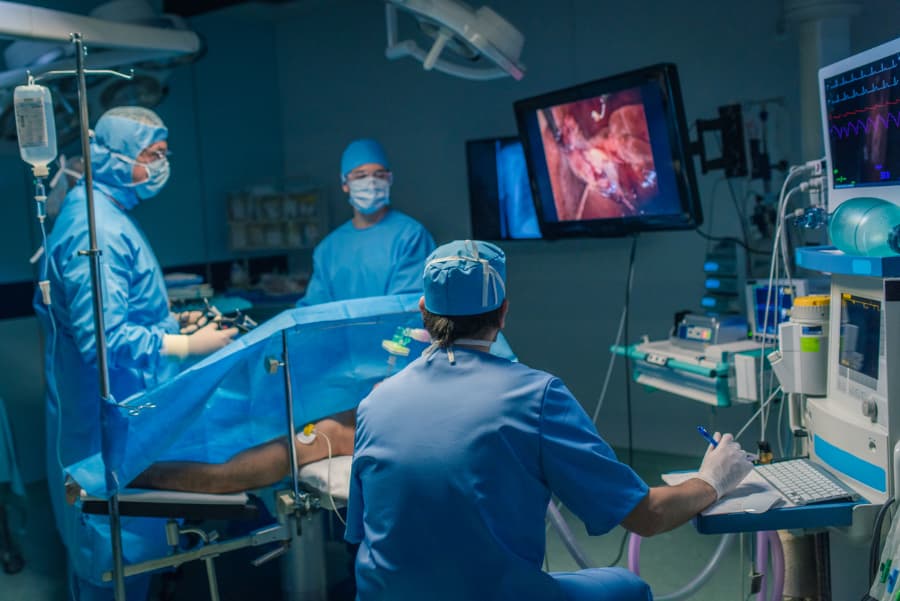 Group of Orthopedic Surgeons Performing Arthroscopy